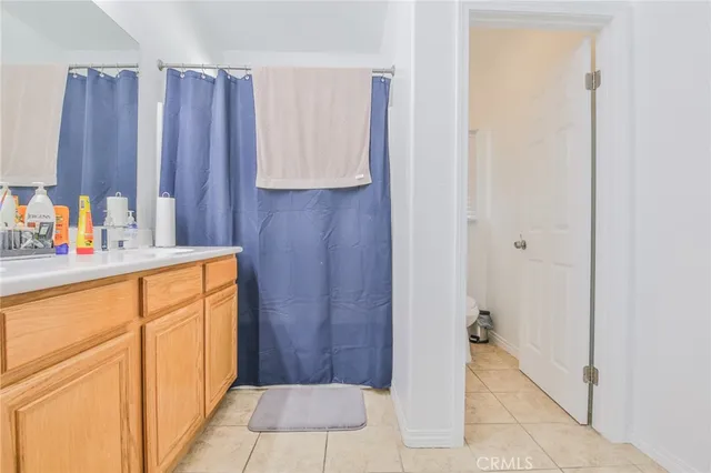 a bathroom with a sink and a shower