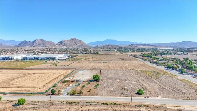 a view of an ocean and a mountain