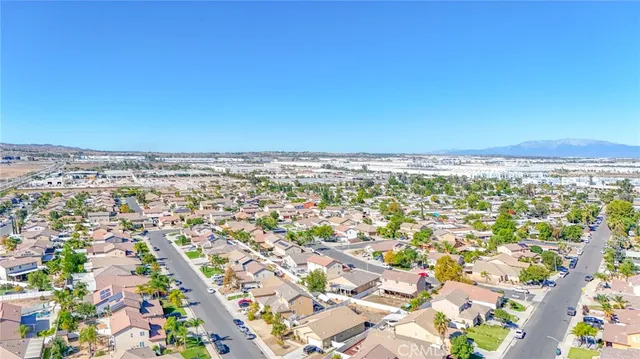 an aerial view of a city with ocean view