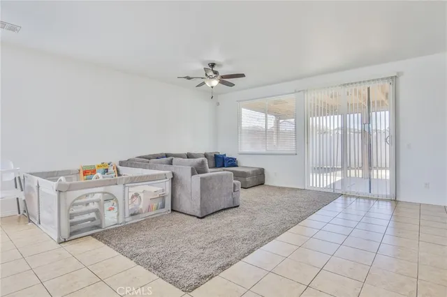 a living room with a couch and a table