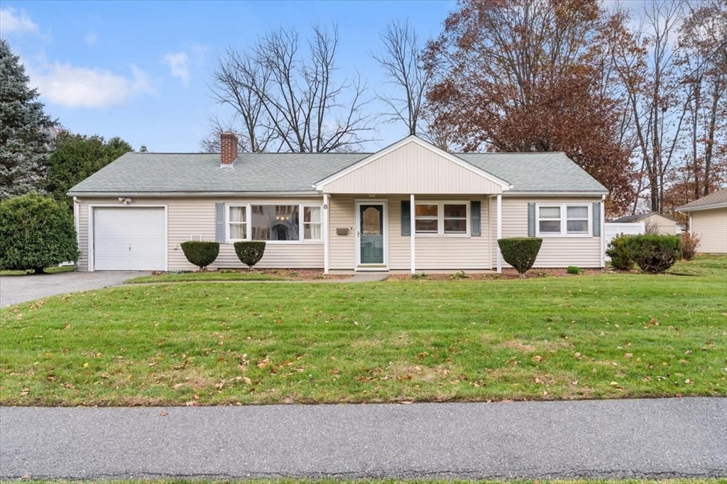 front view of a house and a yard