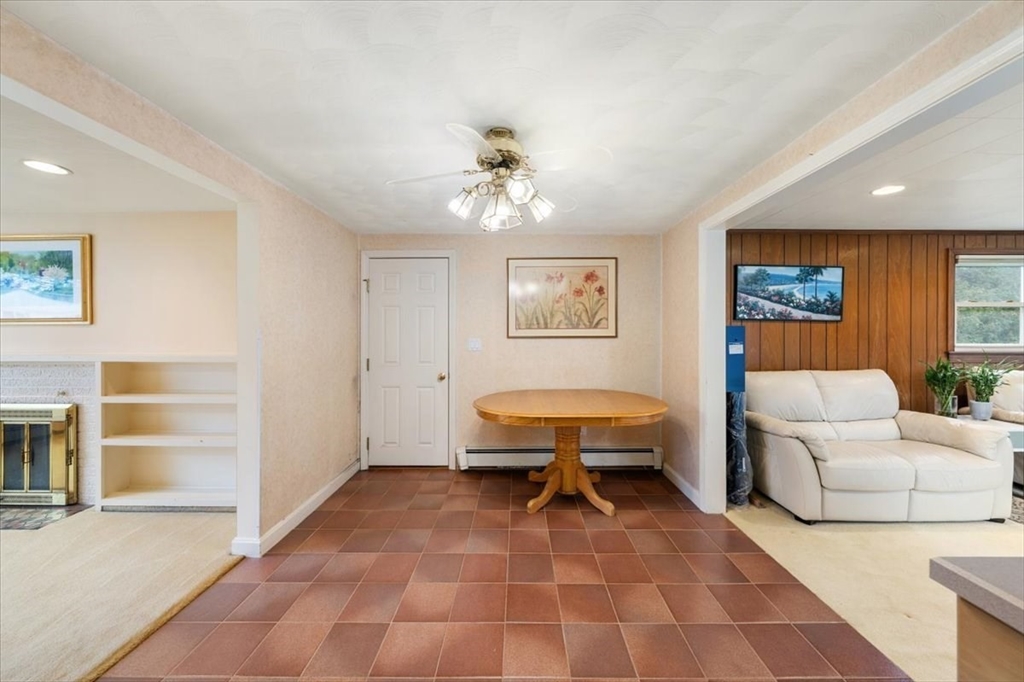 8 Stanley Street Natick, MA 01760 - Photo 13 of 35 a living room with furniture and a chandelier