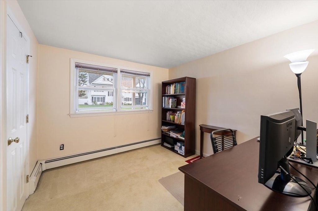 8 Stanley Street Natick, MA 01760 - Photo 14 of 35 a view of a workspace with furniture and a window