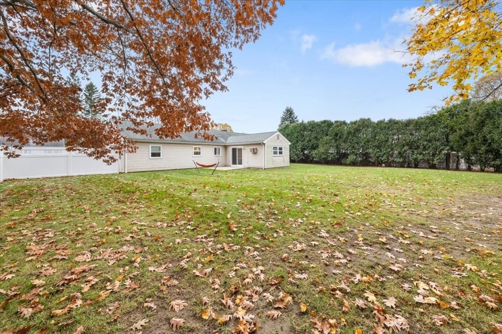 8 Stanley Street Natick, MA 01760 - Photo 18 of 35 a view of a field with an tree in front of it