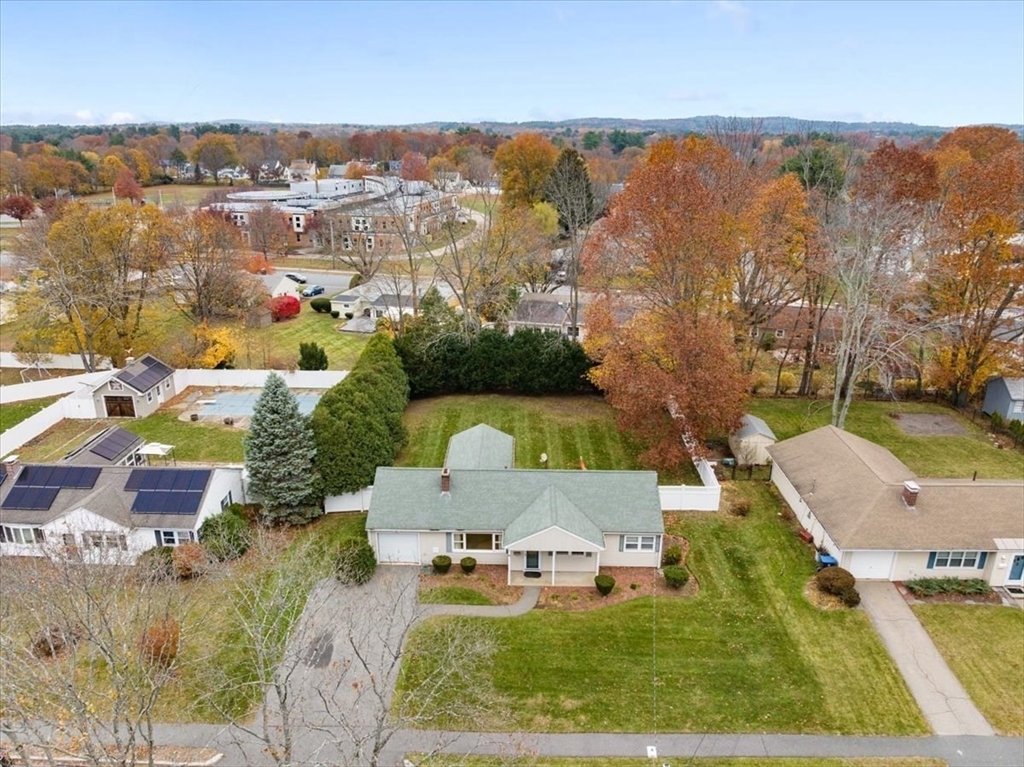 8 Stanley Street Natick, MA 01760 - Photo 26 of 35 an aerial view of residential houses with outdoor space and swimming pool