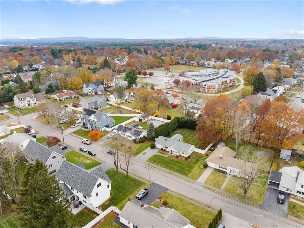 8 Stanley Street Natick, MA 01760 - Photo 29 of 35 an aerial view of residential houses with outdoor space