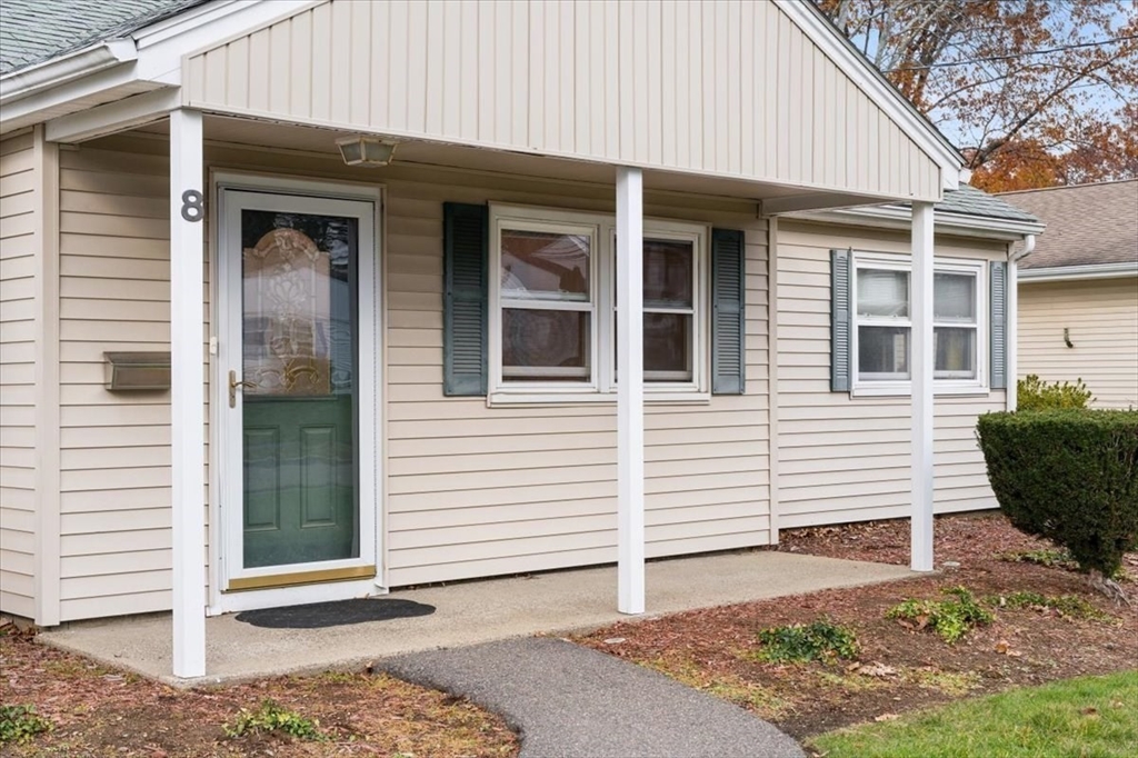 8 Stanley Street Natick, MA 01760 - Photo 31 of 35 a front view of a house with a yard