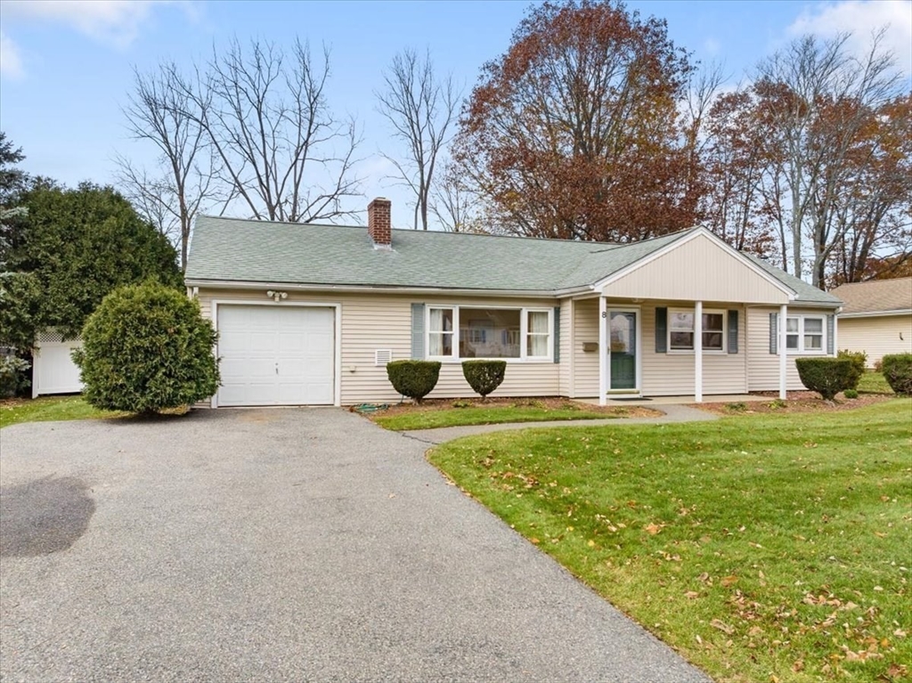 8 Stanley Street Natick, MA 01760 - Photo 32 of 35 a front view of a house with a garden