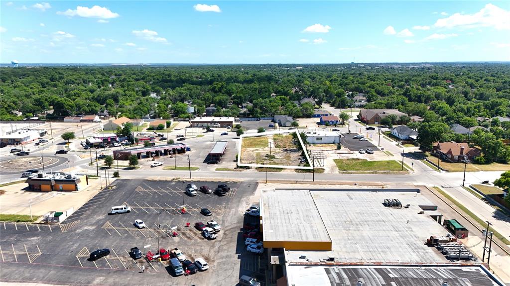 3607 East Rosedale Street Fort Worth, TX 76105 - Photo 10 of 15 Aerial overview of property's location with property parcel outlined and a forest