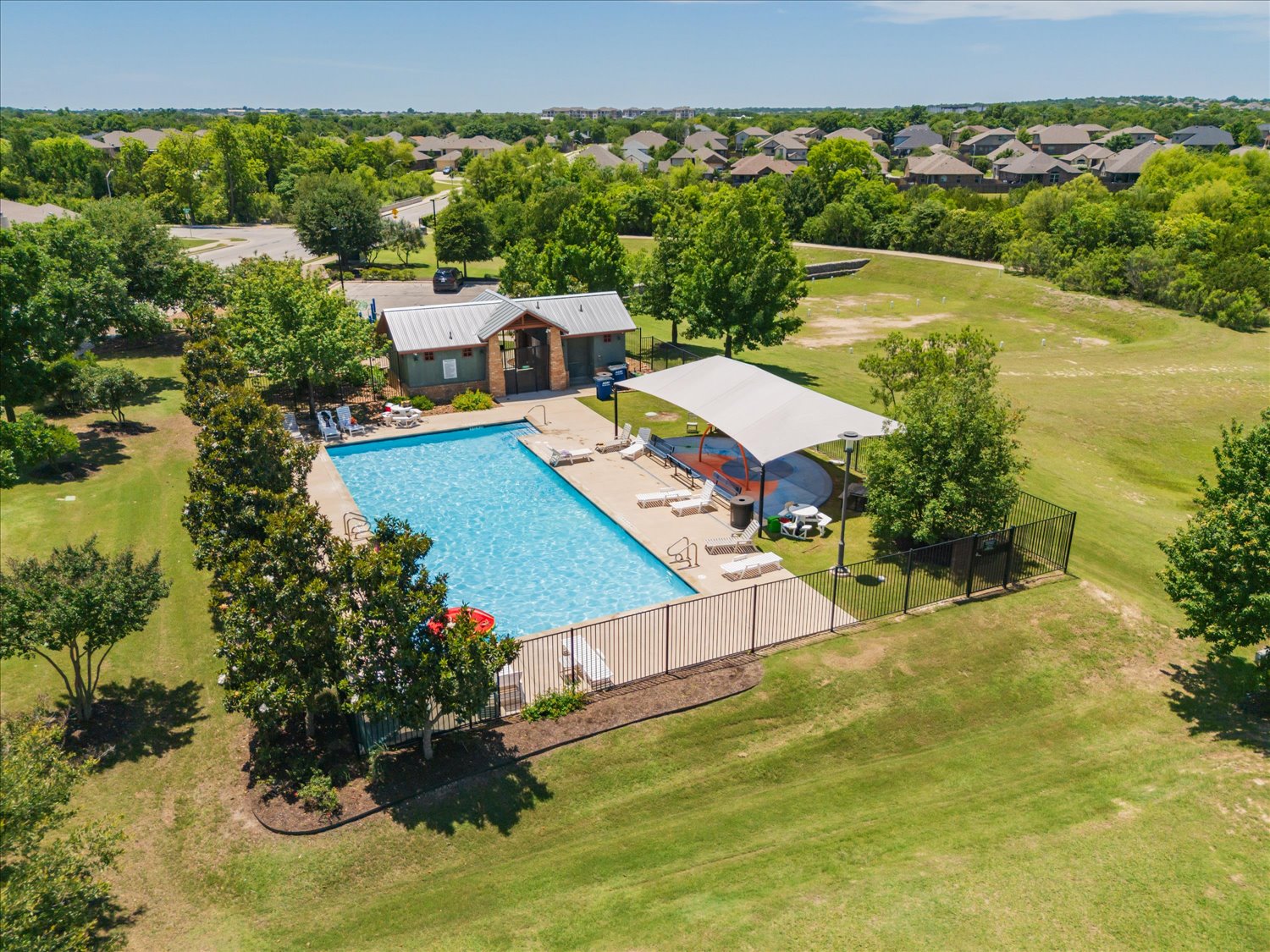 717 Kaluga Trail Leander, TX 78641 - Photo 38 of 40 an aerial view of house with yard swimming pool and outdoor seating