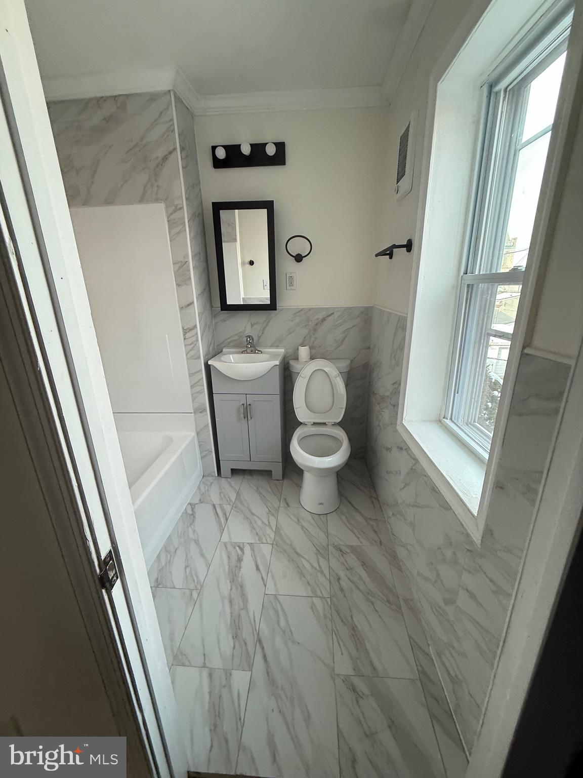 542 Moss Street Reading, PA 19604 - Photo 15 of 19 a view of a toilet in a room