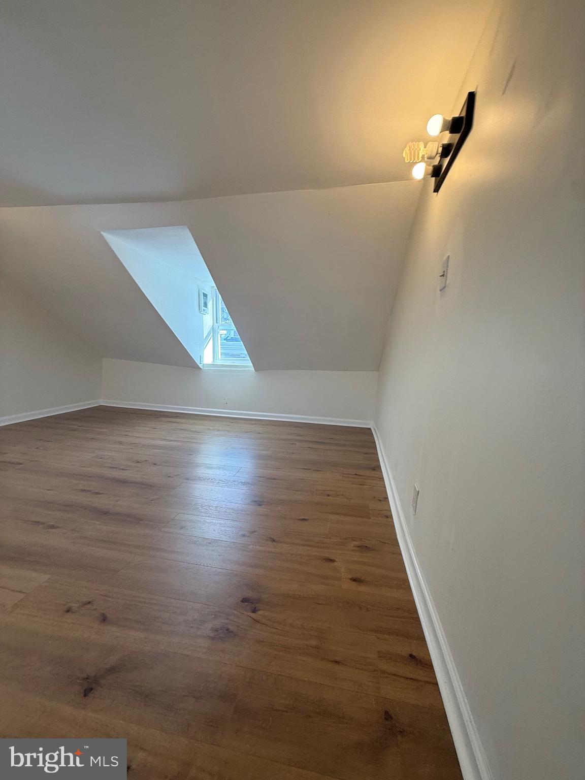 542 Moss Street Reading, PA 19604 - Photo 18 of 19 a view of a room with wooden floor