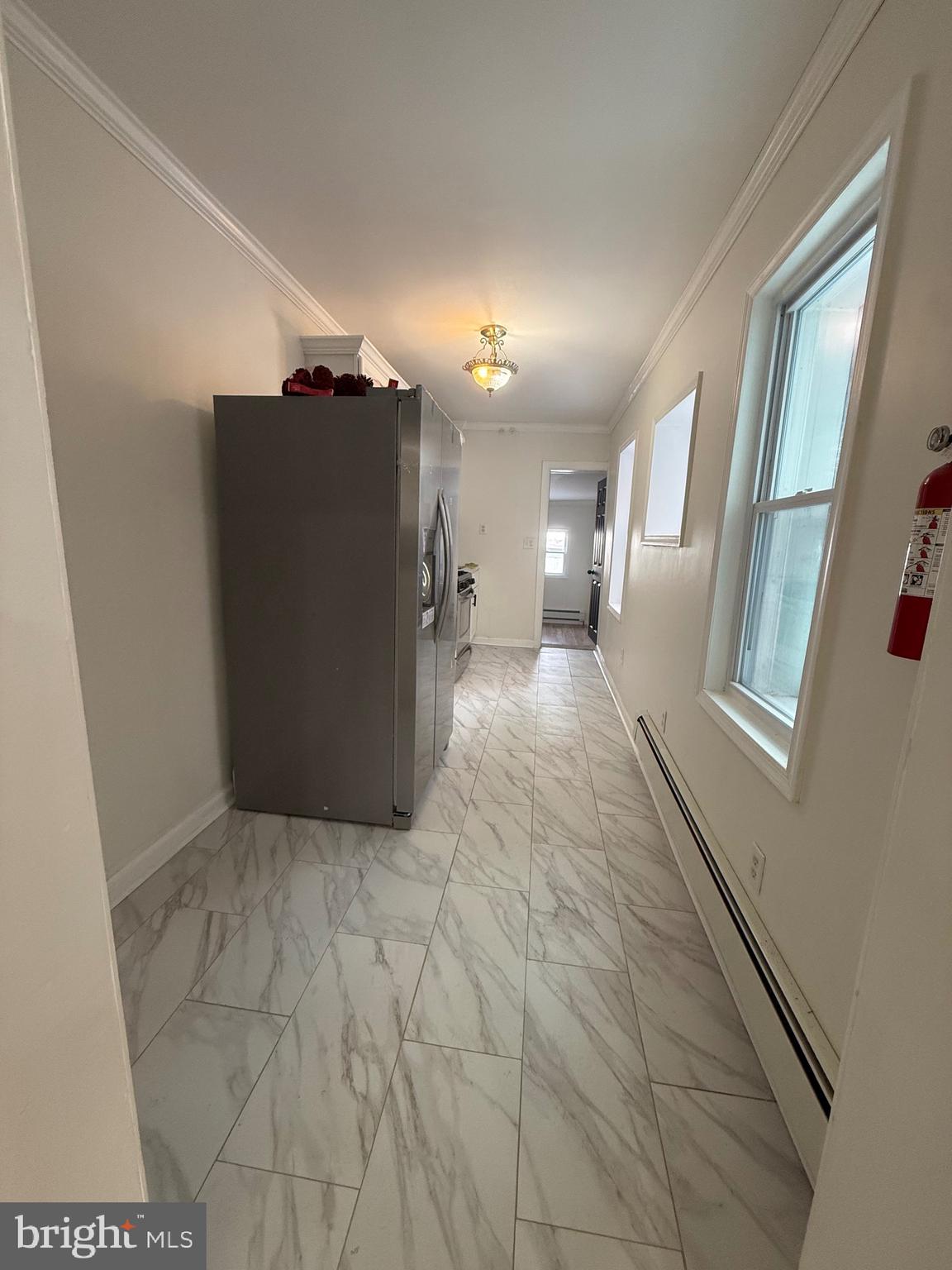 542 Moss Street Reading, PA 19604 - Photo 5 of 19 a view of a hallway with entryway