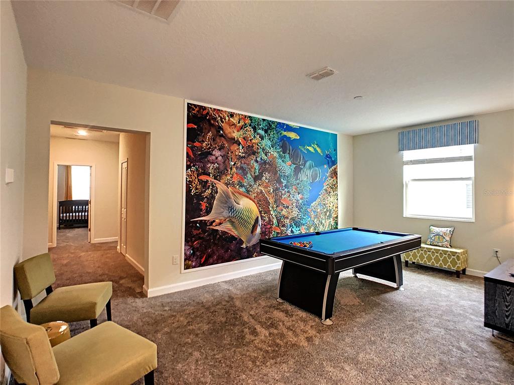 2736 Bookmark Drive Kissimmee, FL 34746 - Photo 20 of 35 a room with furniture and window