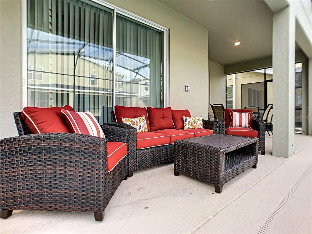 2736 Bookmark Drive Kissimmee, FL 34746 - Photo 28 of 35 a living room with furniture