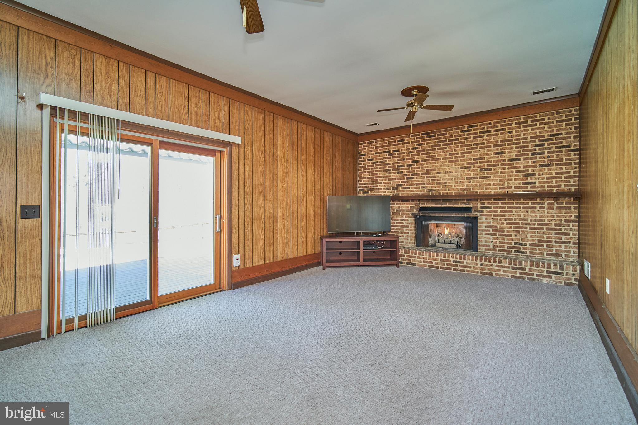 9512 Burning Branch Road Burke, VA 22015 - Photo 11 of 30 Family Room w/ gas FP has access to the patio