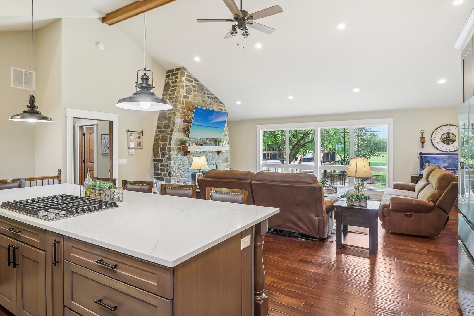 22517 Grange Road Marengo, IL 60152 - Photo 11 of 39 a kitchen with a table chairs stove and wooden floor