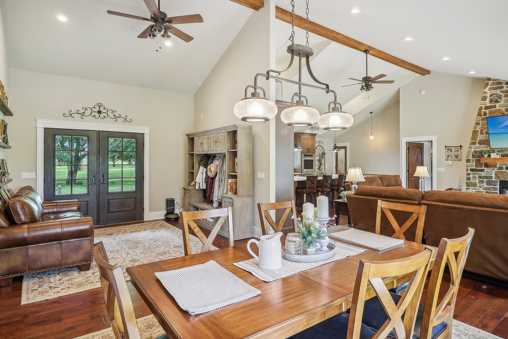 22517 Grange Road Marengo, IL 60152 - Photo 14 of 39 a view of a dining room with furniture a chandelier and wooden floor