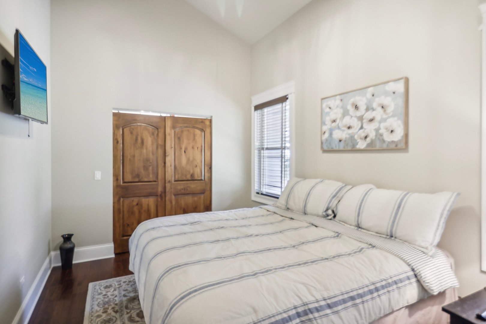 22517 Grange Road Marengo, IL 60152 - Photo 21 of 39 a bedroom with a bed and a flat screen tv