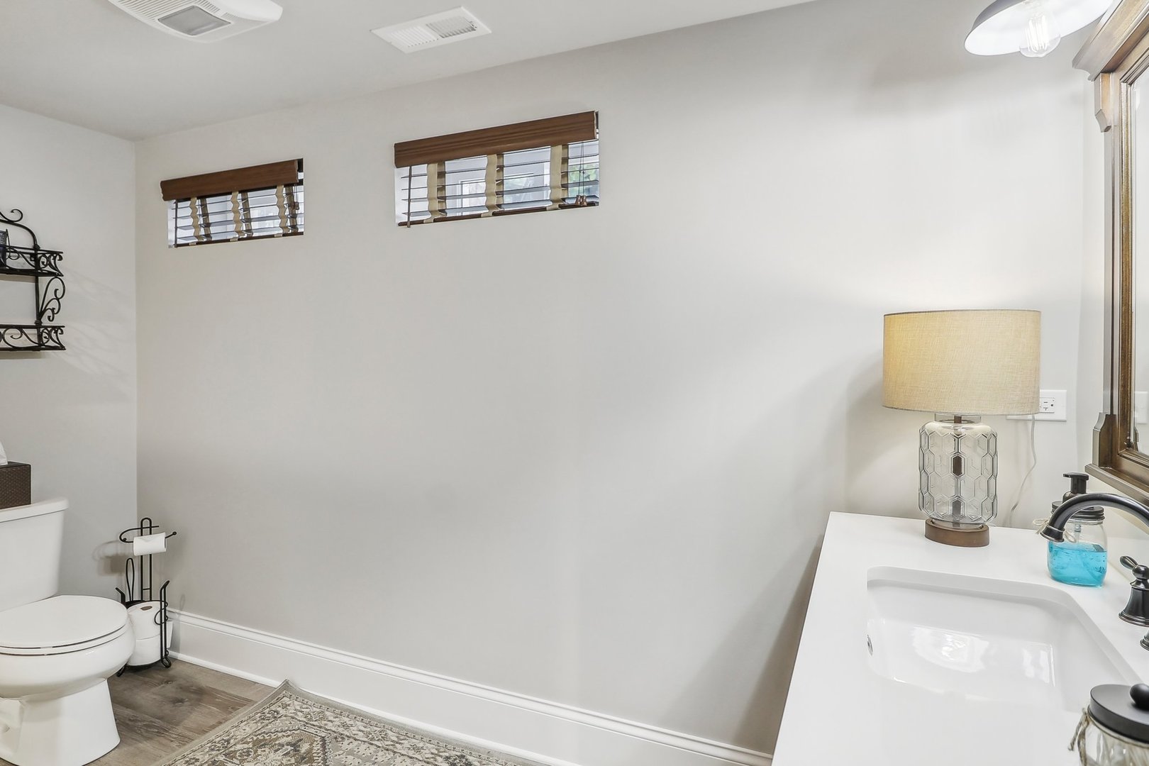 22517 Grange Road Marengo, IL 60152 - Photo 27 of 39 a bathroom with a sink toilet and vanity