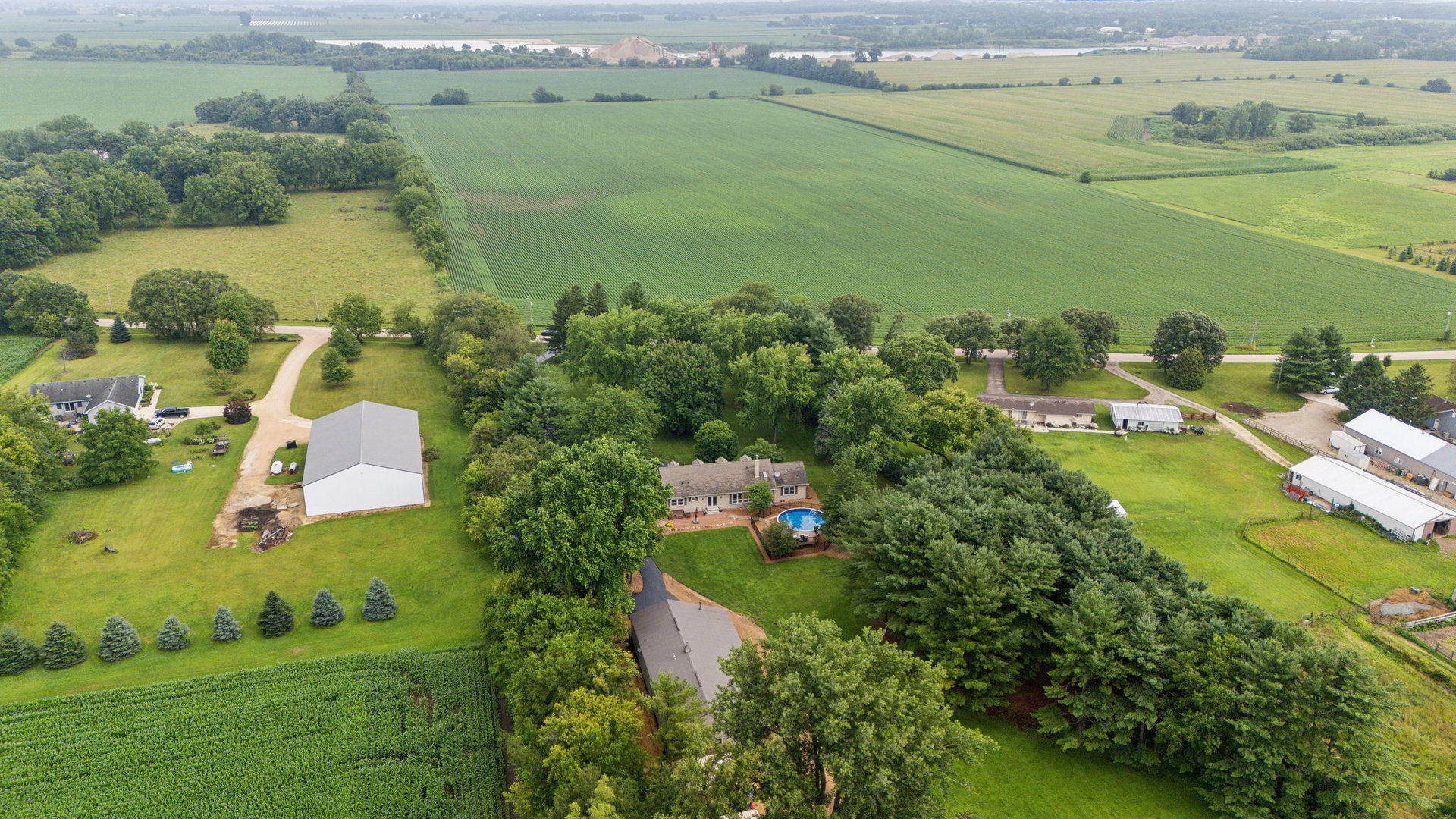 22517 Grange Road Marengo, IL 60152 - Photo 35 of 39 a aerial view of a house with a yard lake lake view and mountain view