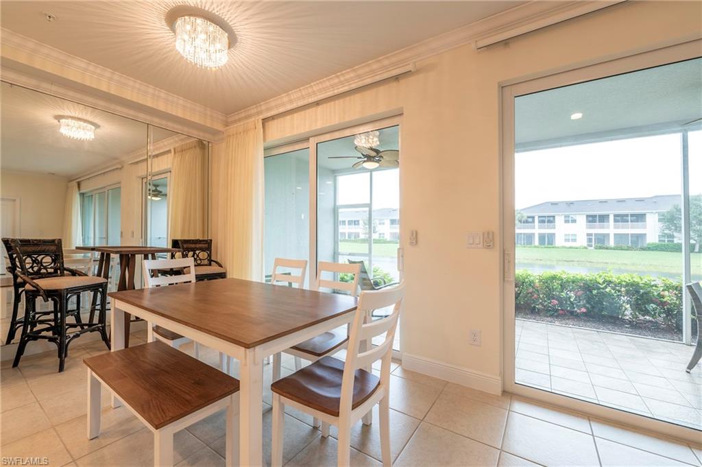 6954 Avalon Circle, Unit 702 Naples, FL 34112 - Photo 18 of 40 a view of a dining room and livingroom view