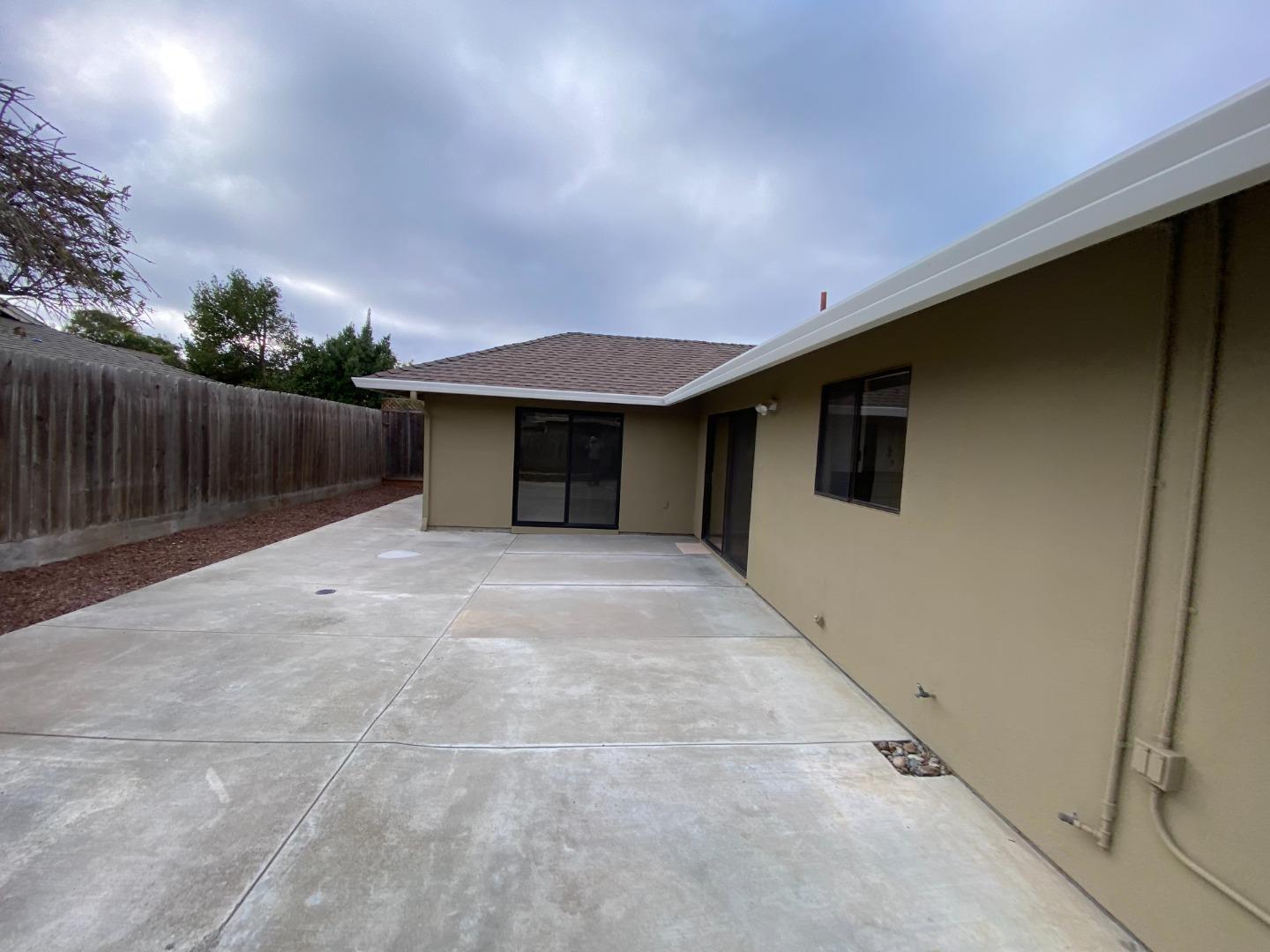 727 Montecito Way Salinas, CA 93901 - Photo 18 of 19 a view of a house with a backyard