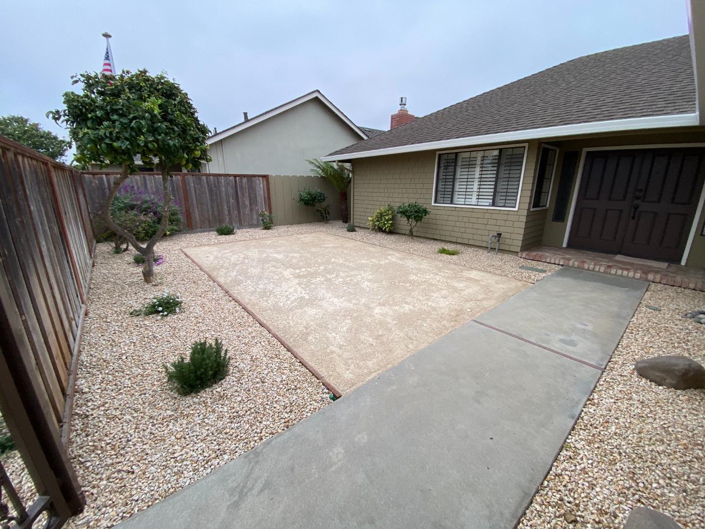 727 Montecito Way Salinas, CA 93901 - Photo 2 of 19 a front view of a house with a yard and garage