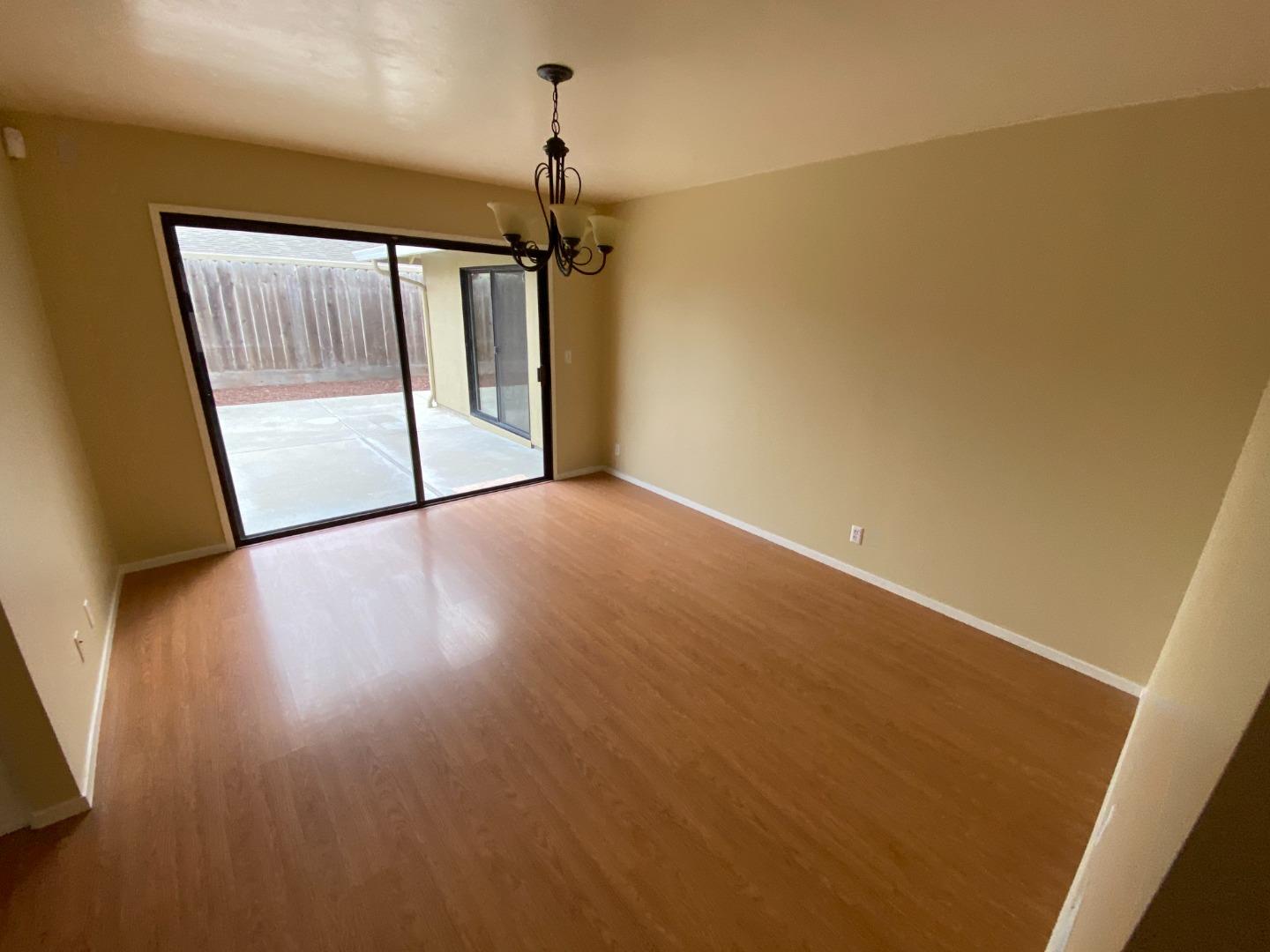 727 Montecito Way Salinas, CA 93901 - Photo 9 of 19 a view of empty room with wooden floor