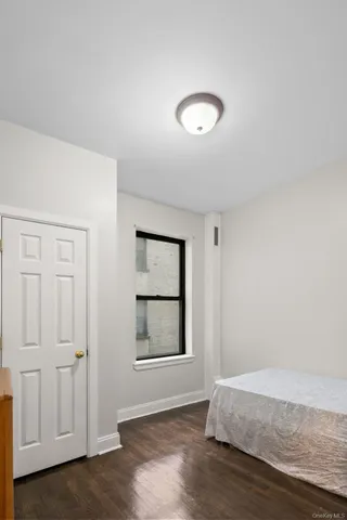 a view of livingroom with hardwood floor and hallway