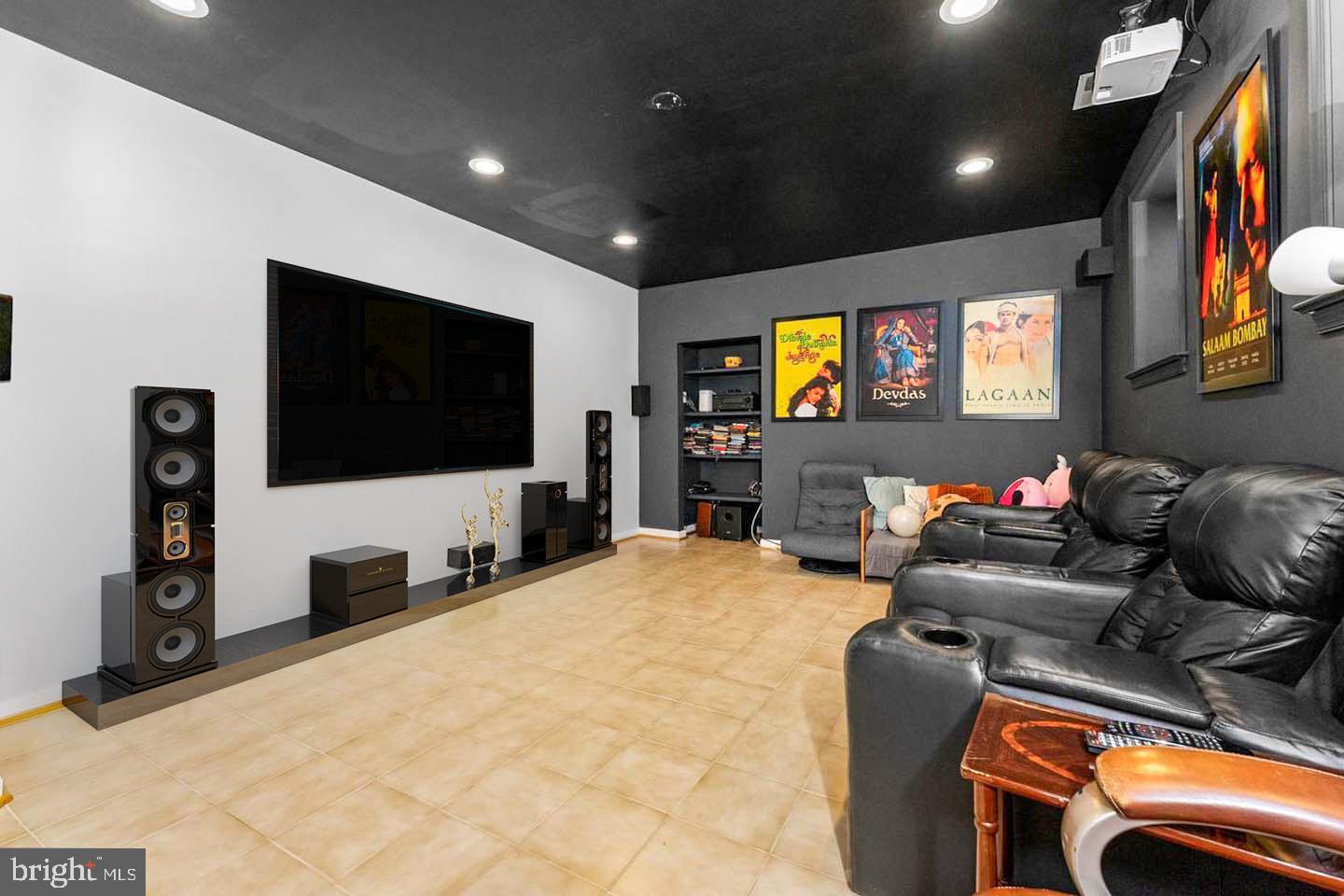 1445 Mayhurst Boulevard McLean, VA 22102 - Photo 30 of 31 a living room with furniture and a flat screen tv