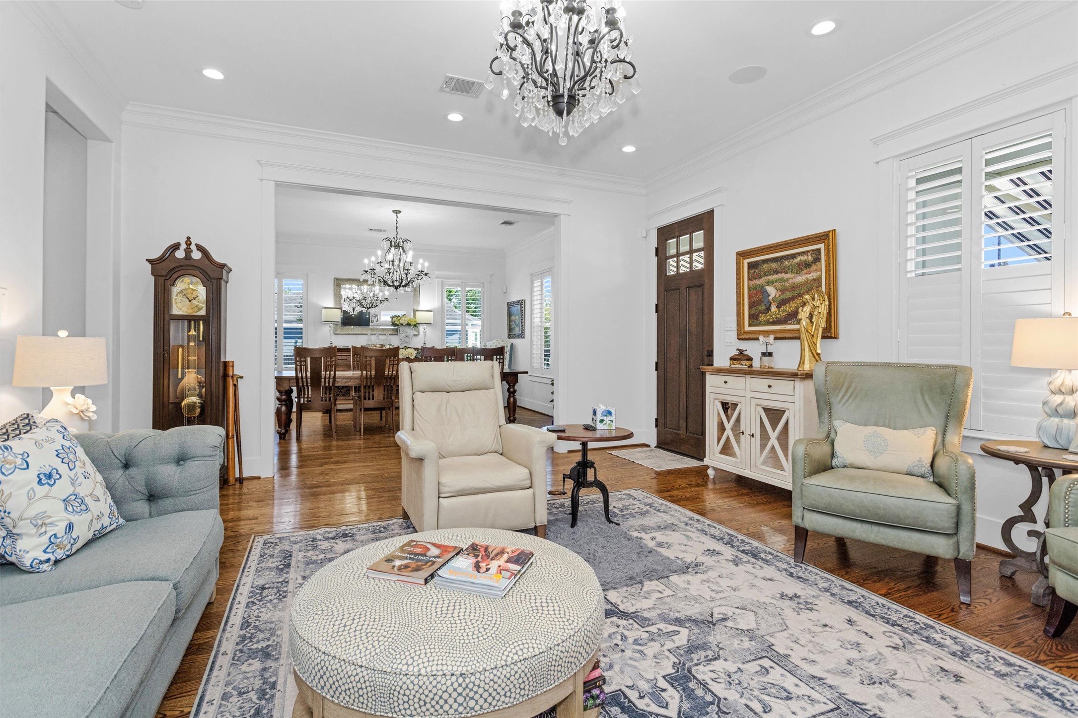 1202 Walton Street Houston, TX 77009 - Photo 6 of 32 This View Highlights the Seamless Flow Between the Living and Dining Rooms, Offering an Open, Inviting Feel While Maintaining Distinct Spaces for Relaxing, Dining, and Entertaining.