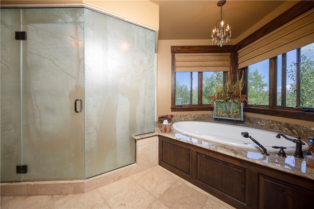130 Hunter's Knob Road Silverthorne, CO 80498 - Photo 18 of 35 Look closely, can you see the subtle laser etching of the bear clinging to the aspen tree in the shower glass?