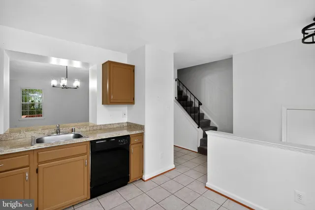a bathroom with a double vanity sink and mirror