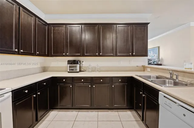 a kitchen with a sink and a cabinets
