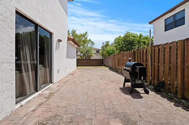 a view of a chairs in front of house