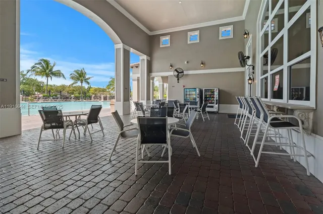 an outdoor space with furniture for seating