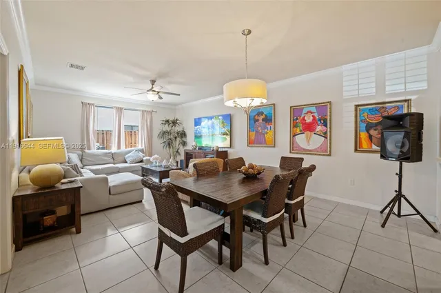 a view of a livingroom with furniture and a chandelier