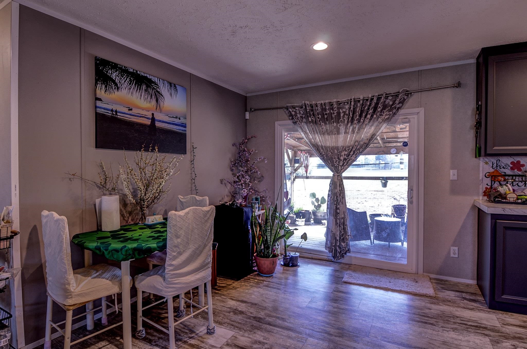 2450 South Neely Road Middleton, TN 38052 - Photo 12 of 38 Dining area with wood finished floors and recessed lighting