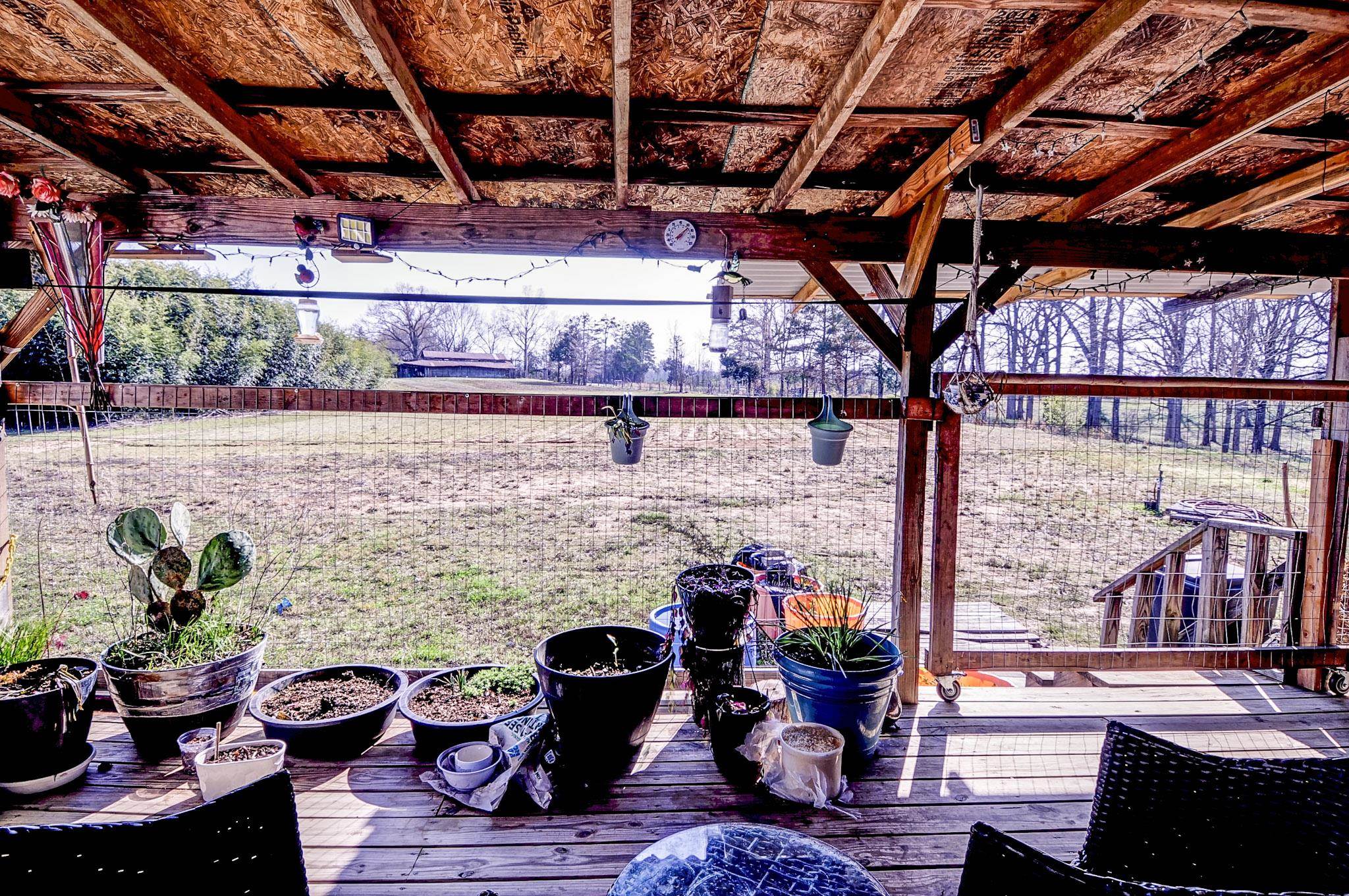 2450 South Neely Road Middleton, TN 38052 - Photo 30 of 38 View of yard featuring a deck