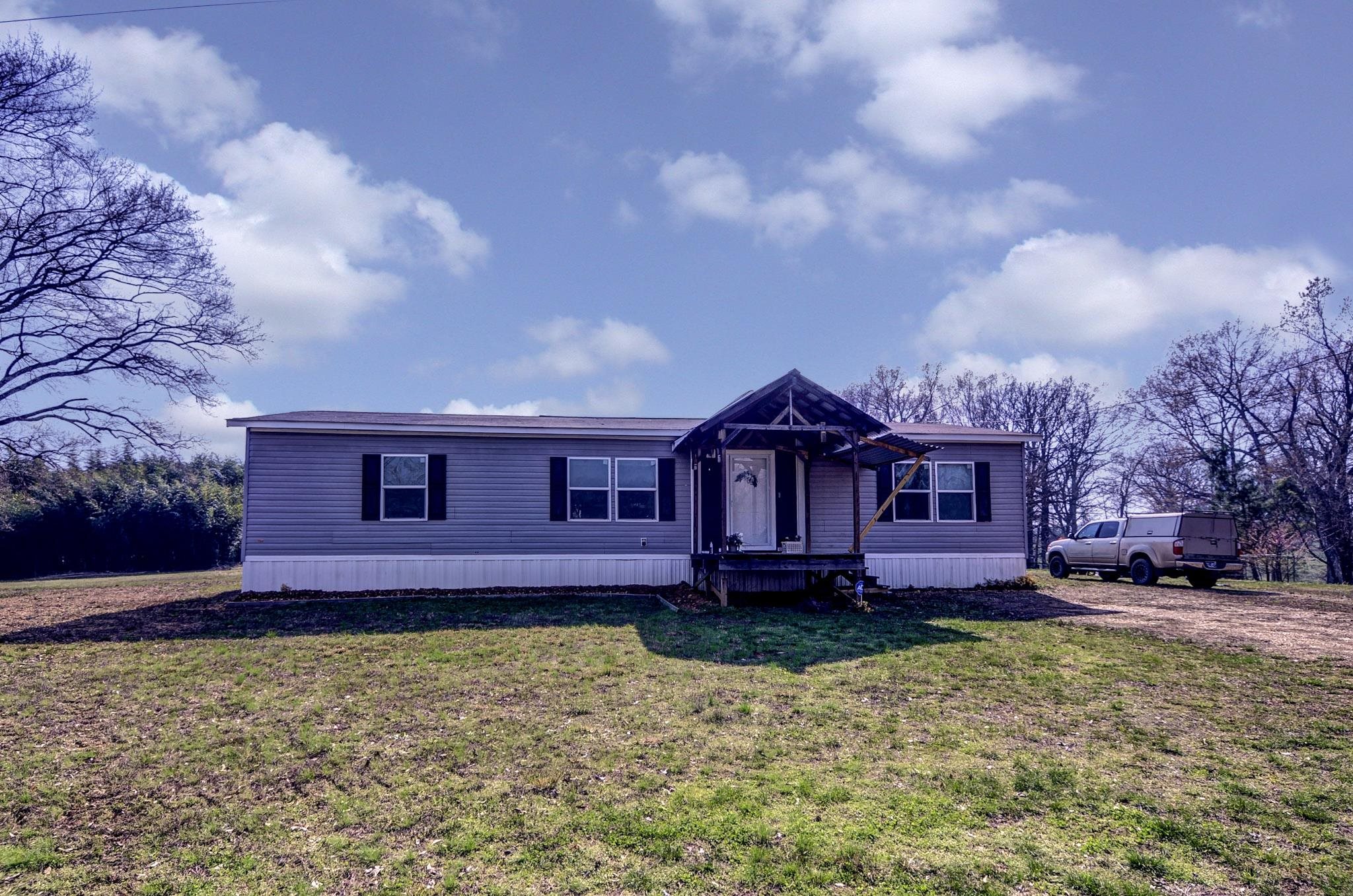 2450 South Neely Road Middleton, TN 38052 - Photo 3 of 36 a view of a house with a big yard