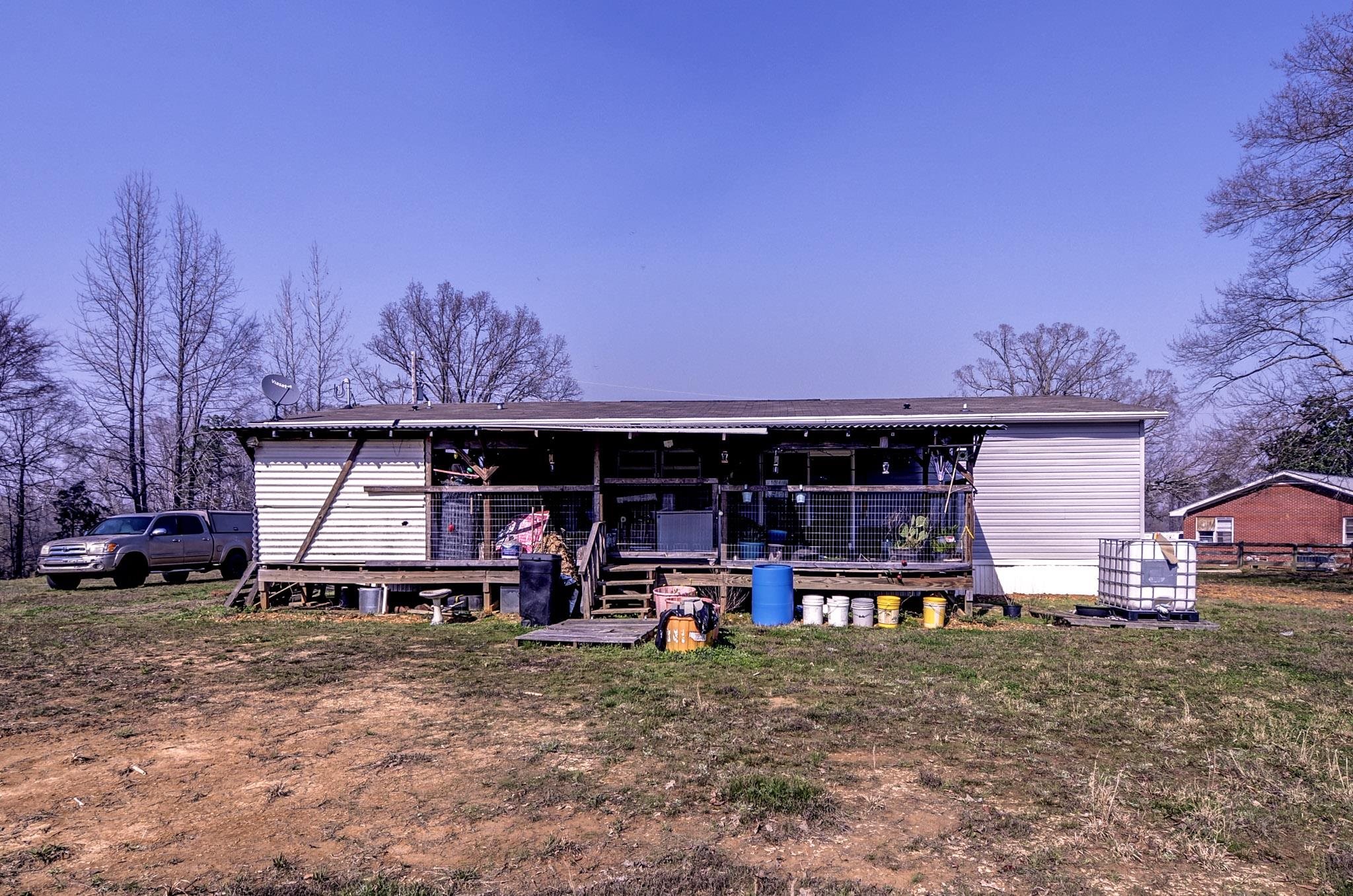 2450 South Neely Road Middleton, TN 38052 - Photo 34 of 38 View of front of house featuring a deck