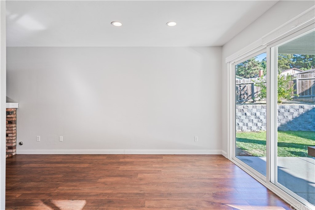 4435 Springtime Drive Oceanside, CA 92056 - Photo 11 of 52 a view of a room with wooden floor and window