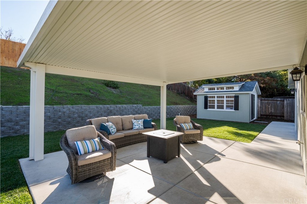 4435 Springtime Drive Oceanside, CA 92056 - Photo 25 of 52 a view of a patio with a table and chairs