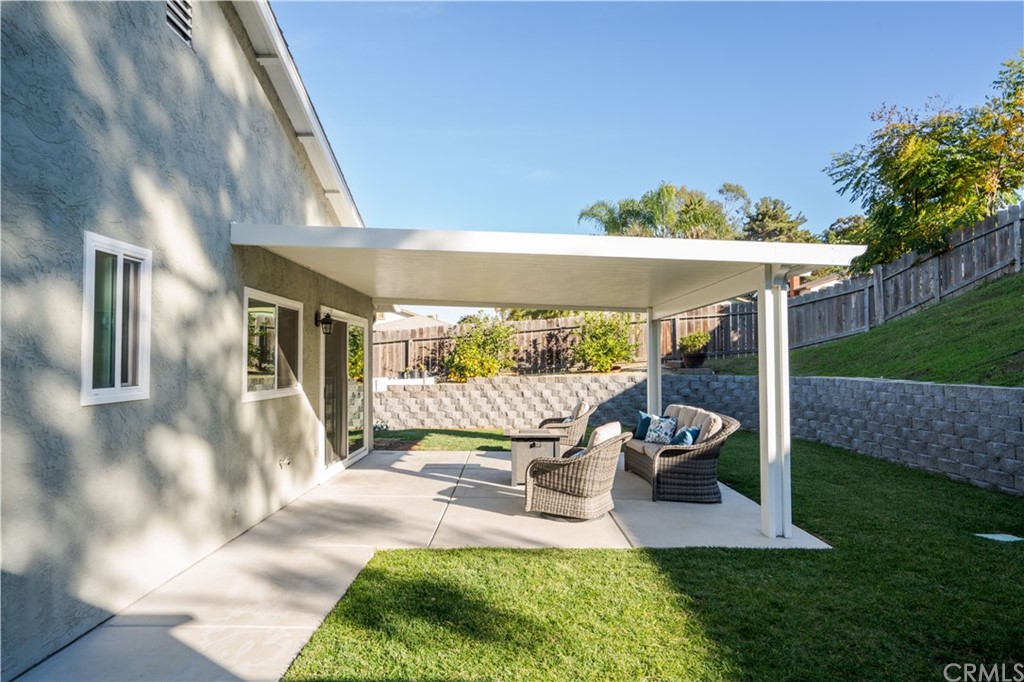 4435 Springtime Drive Oceanside, CA 92056 - Photo 28 of 52 a view of a chair and table in backyard of the house