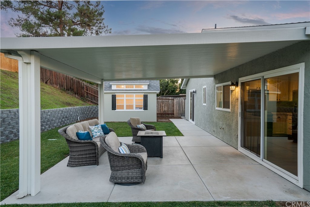4435 Springtime Drive Oceanside, CA 92056 - Photo 31 of 52 a balcony with furniture and a potted plant