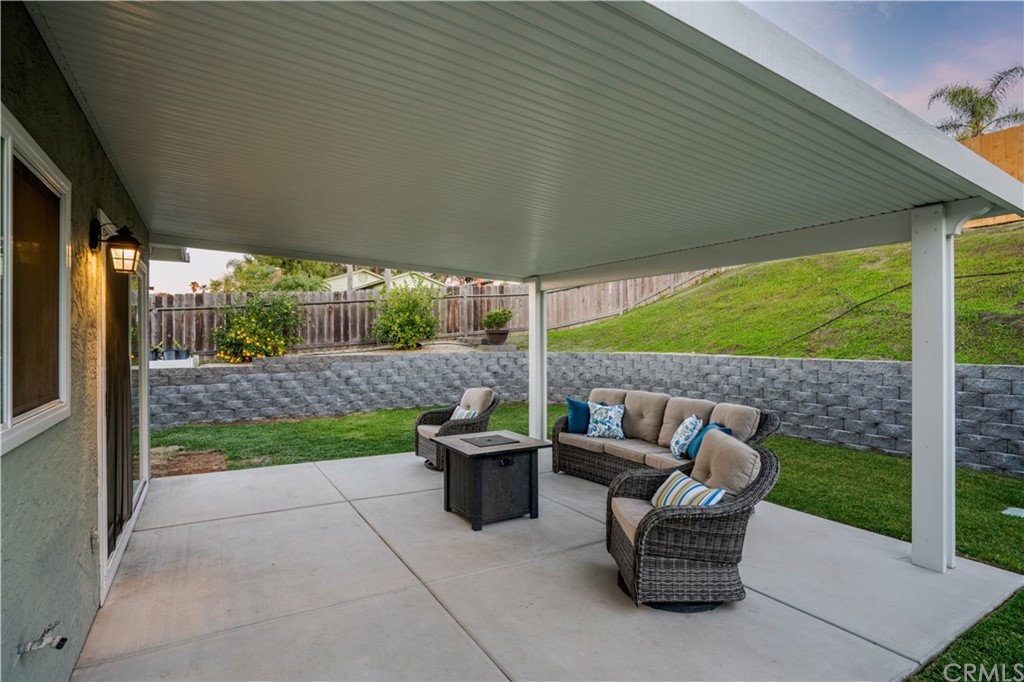 4435 Springtime Drive Oceanside, CA 92056 - Photo 32 of 52 a view of a patio with a chairs and table in the patio