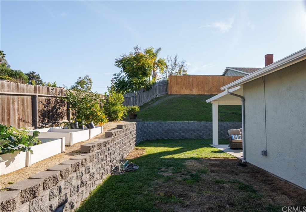4435 Springtime Drive Oceanside, CA 92056 - Photo 39 of 52 a view of a backyard with a garden