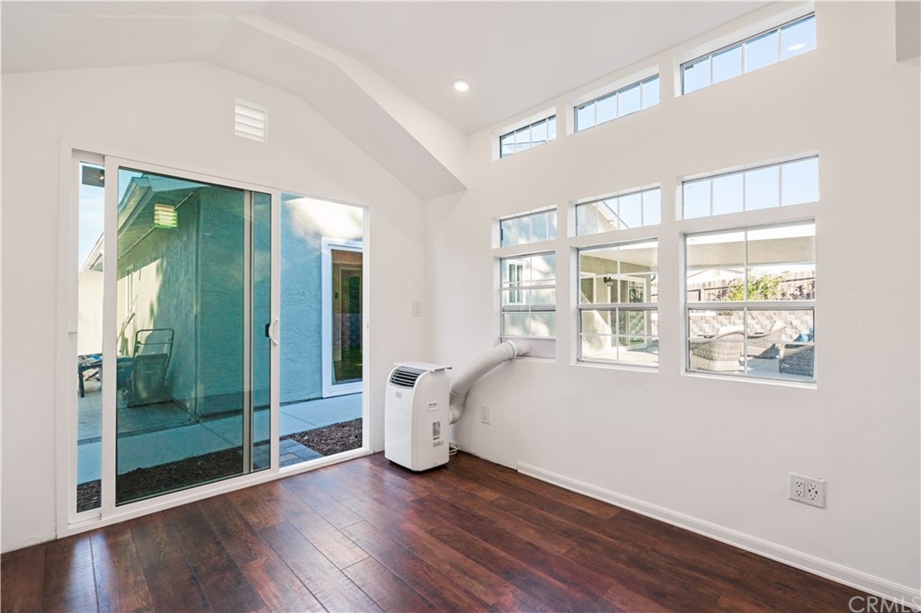 4435 Springtime Drive Oceanside, CA 92056 - Photo 43 of 52 a view of a room with wooden floor and windows
