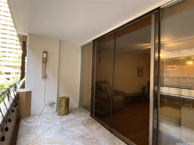 a spacious bedroom with a bed and a couch